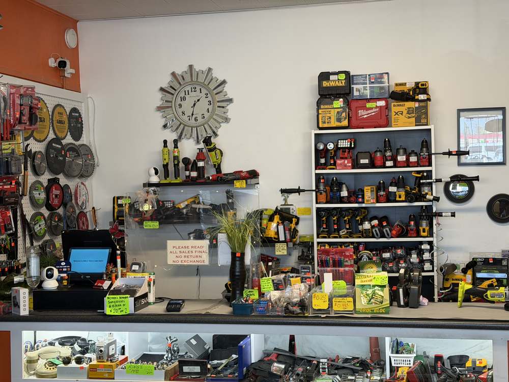 Front counter at Deelz Tools and Such Calgary with cordless drills and saw blades